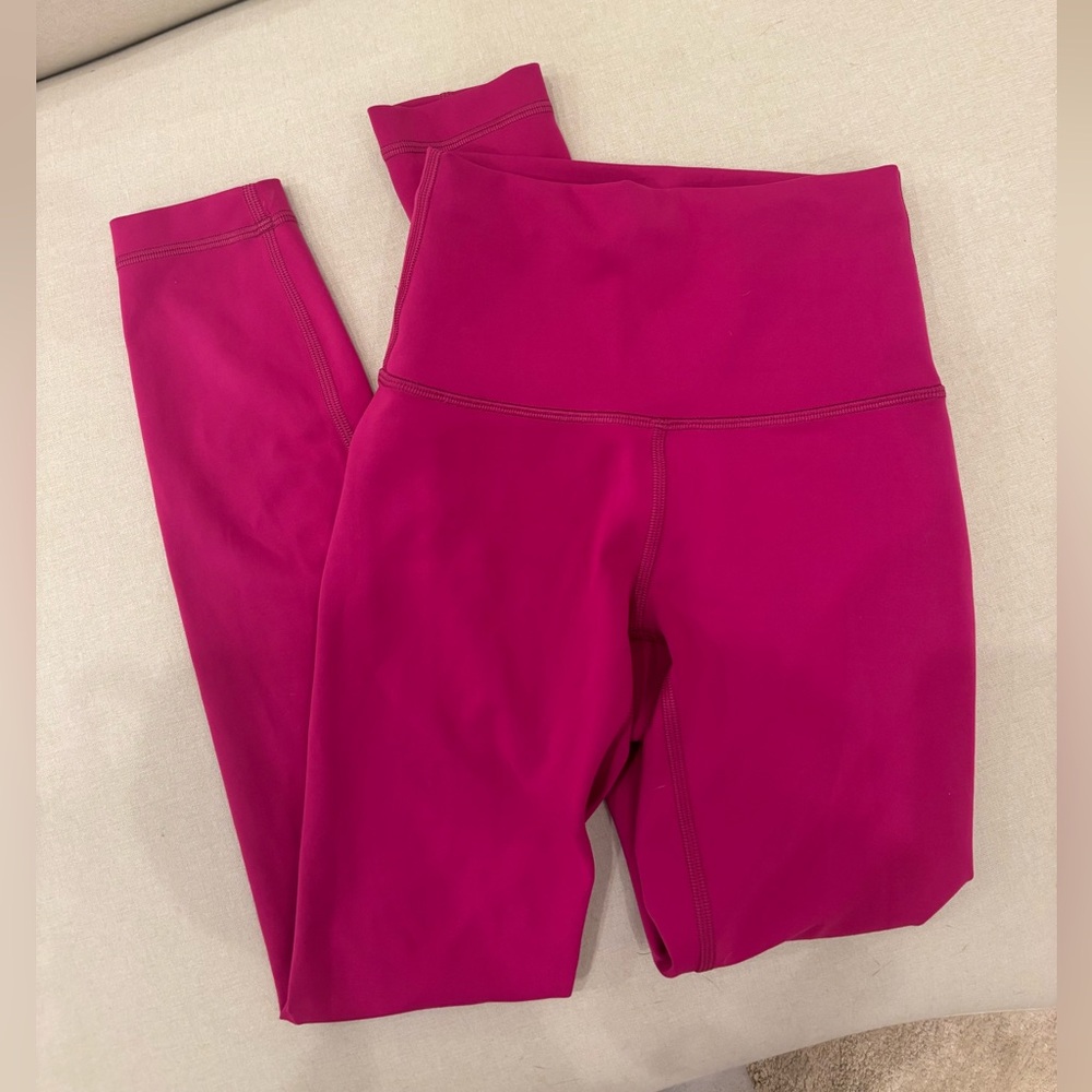 Lululemon Wunder Train High-Rise Tight in color Passionate